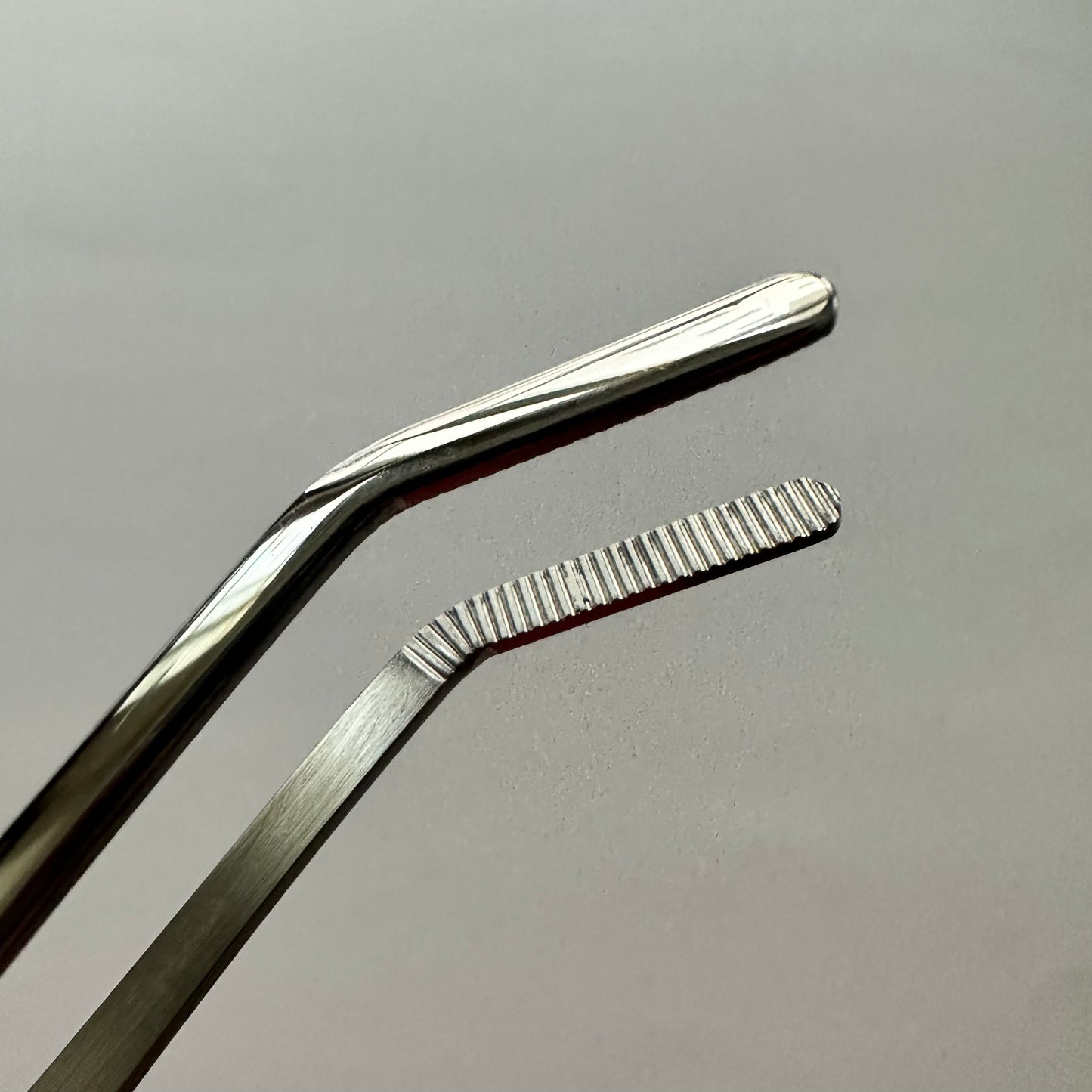 The 8 inch Thick Curve Tip tweezer