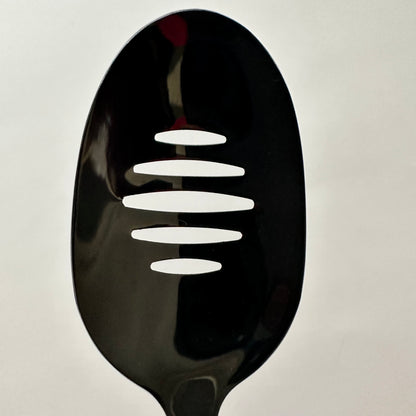 The Small Slotted Spoon
